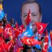 Supporters of Turkey's President Tayyip Erdogan wave flags during a rally ahead of the local elections in Istanbul, Turkey March 30, 2024. REUTERS/Umit Bektas