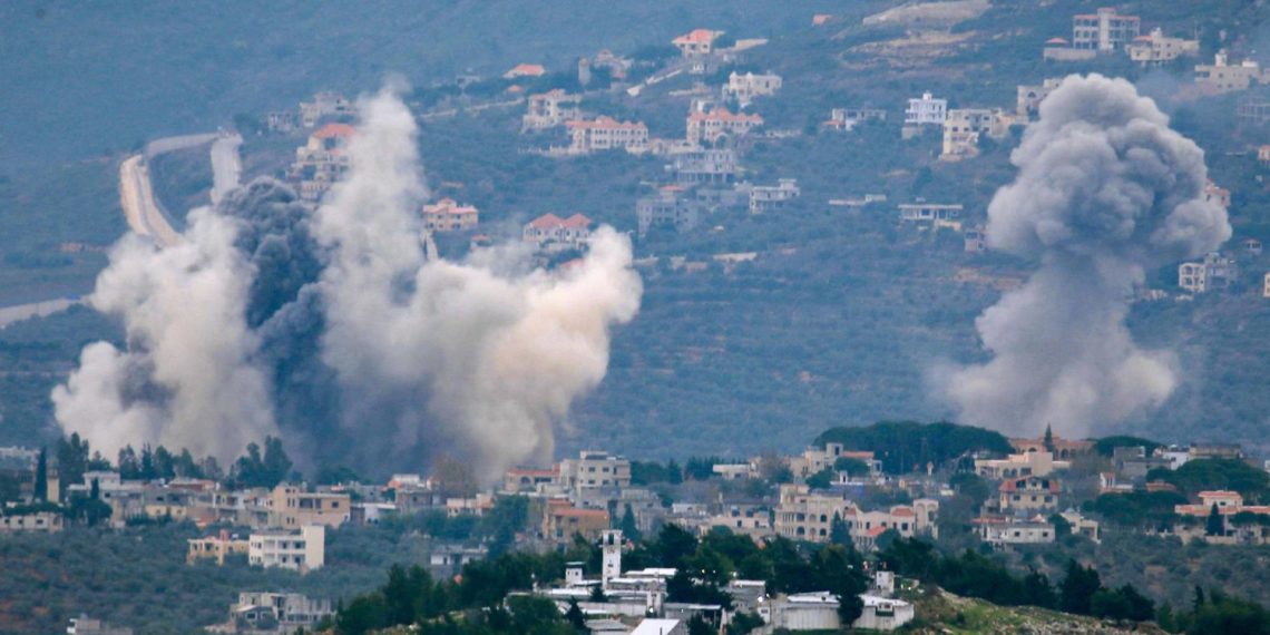 TOPSHOT - Smoke billows after Israeli bombardment over Lebanon's southern town of Kfar Kila near the border with Israel on December 21, 2023, amid ongoing cross-border tensions as fighting continues between Israel and Hamas militants in Gaza. (Photo by AFP)