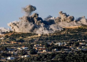 TOPSHOT - This picture taken from a position along the border in northern Israel on December 26, 2023 shows smoke billowing in the southern Lebanese village of Marwahin following Israeli bombardment amid ongoing cross-border tensions as fighting continues between Israel and Hamas militants in the Gaza Strip. (Photo by Jalaa MAREY / AFP)