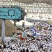 MECCA, SAUDI ARABIA:  Muslim pilgrims arrive to take part in the "Stoning of Satan" ritual of the annual hajj pilgrimage at one of the "jamarat", or three pillars symbolising the devil, 20 January 2005 in Mina, near Mecca. According to tradition, it is the place where Satan appeared first to Abraham, to his son, Ishmael, and to Ishmael's mother Hagar. All three pillars are to be stoned as the ritual resumes on Friday and Saturday, as the Islamic world marked the Eid al-Adha feast of sacrifice. AFP PHOTO/KARIM SAHIB   (Photo credit should read KARIM SAHIB/AFP/Getty Images)