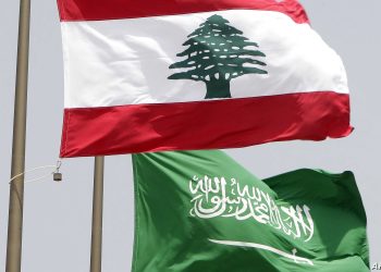 (FILES) In this file photo taken on July 30, 2010, Lebanese (top) and Saudi national flags fly in the Lebanese capital Beirut. - Saudi Arabia said on October 29 it was recalling its ambassador to Lebanon and giving Beirut's envoy 48 hours to leave Riyadh, after "insulting" remarks made by Lebanon's minister of information on the Yemen war. (Photo by Joseph EID / AFP)