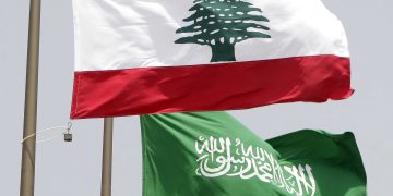 (FILES) In this file photo taken on July 30, 2010, Lebanese (top) and Saudi national flags fly in the Lebanese capital Beirut. - Saudi Arabia said on October 29 it was recalling its ambassador to Lebanon and giving Beirut's envoy 48 hours to leave Riyadh, after "insulting" remarks made by Lebanon's minister of information on the Yemen war. (Photo by Joseph EID / AFP)